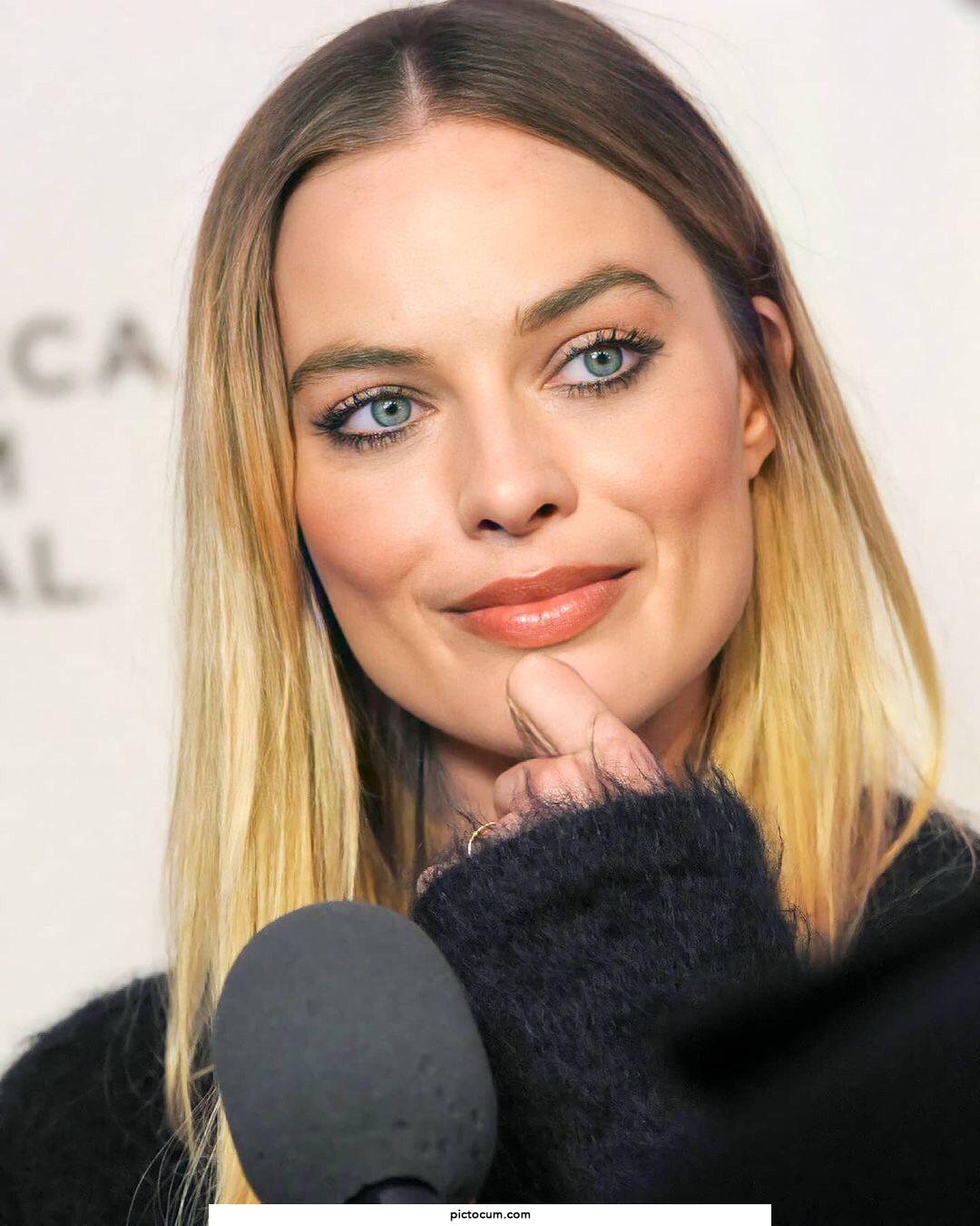 What is Margot Robbie looking at?