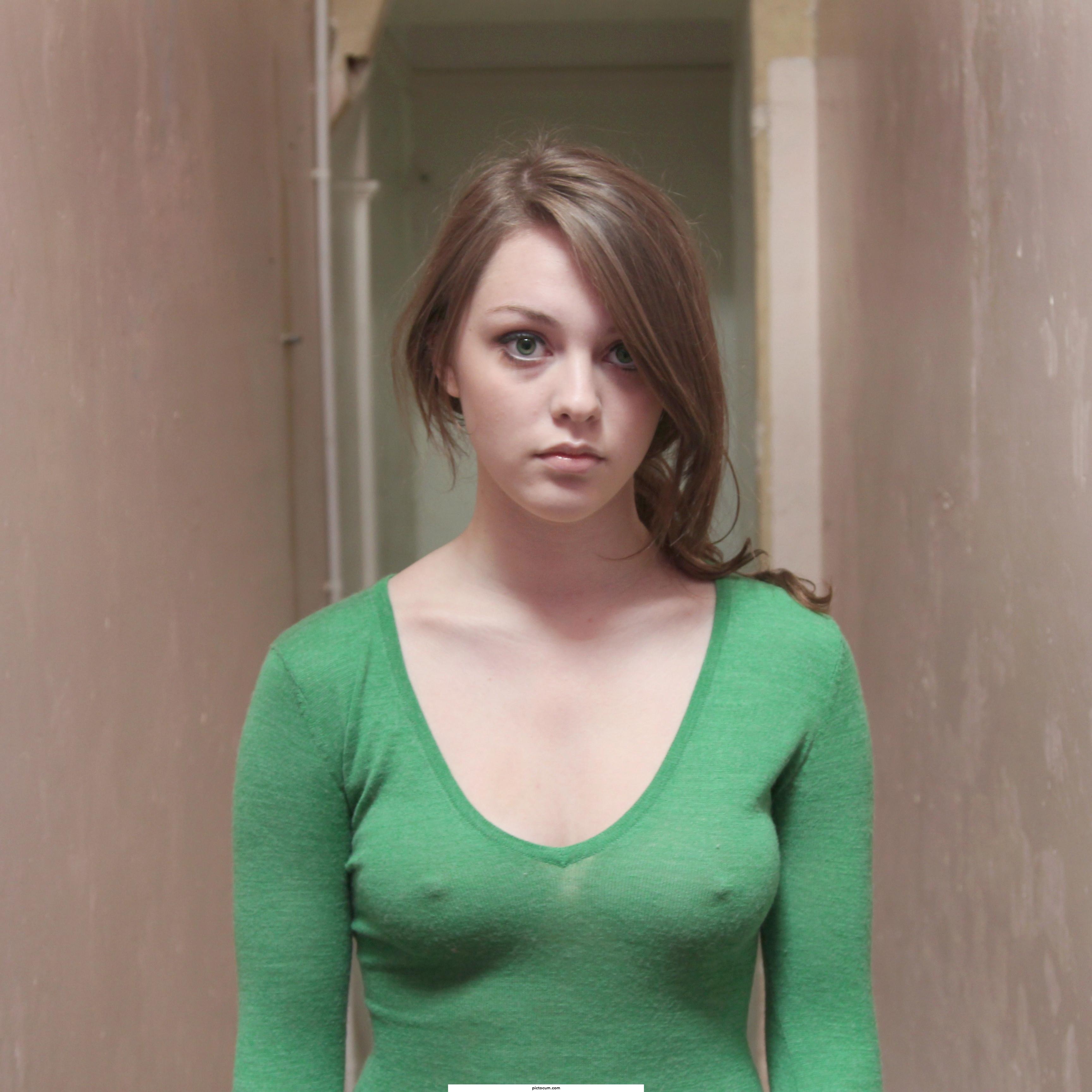 Tight green sweater
