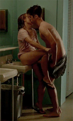 Kirsten Bell in a public Bathroom