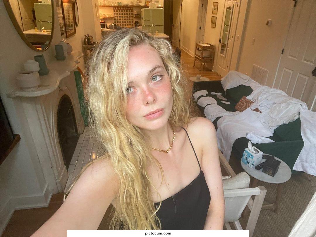 Elle Fanning looking like the perfect snow bunny ready for a room full of BBC