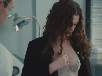 Anne Hathaway embarrassed boob reveal