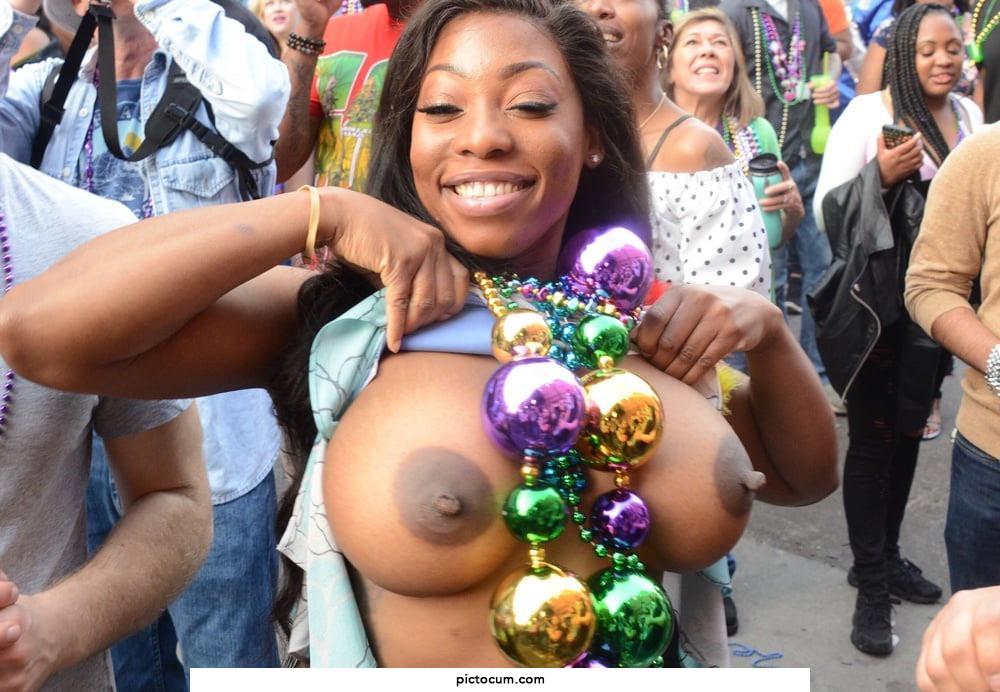 Flashing boobs at Mardi