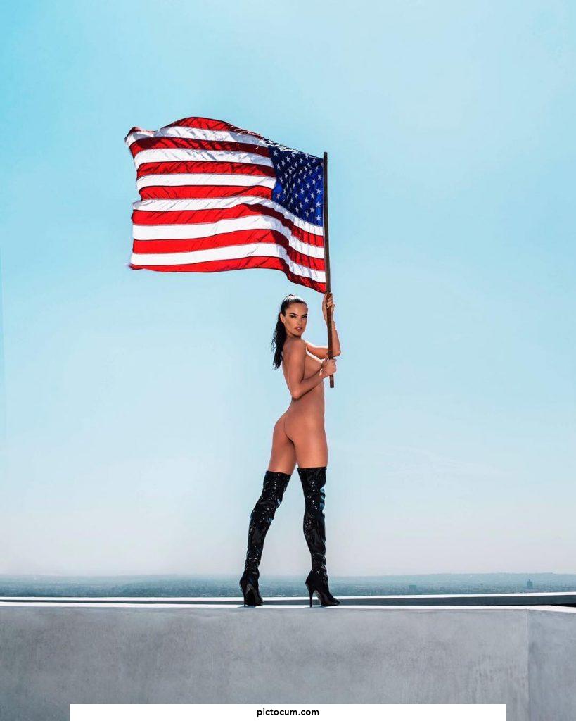 Proudly naked and waving the Red, White and Blue!