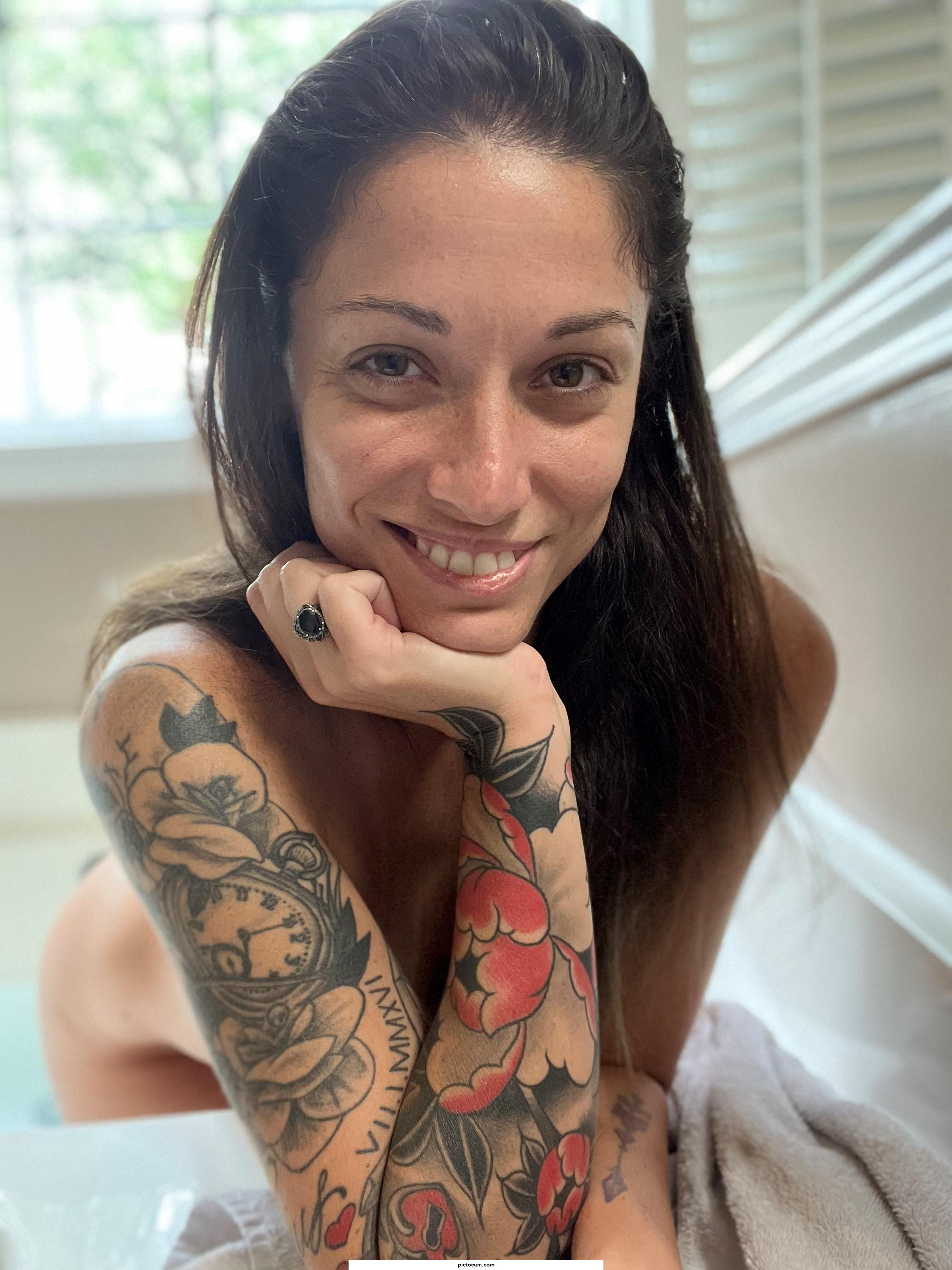 Wearing my tats, a smile and nothing else😁