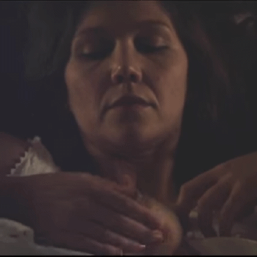Maggie Gyllenhaal squeezing out some milk