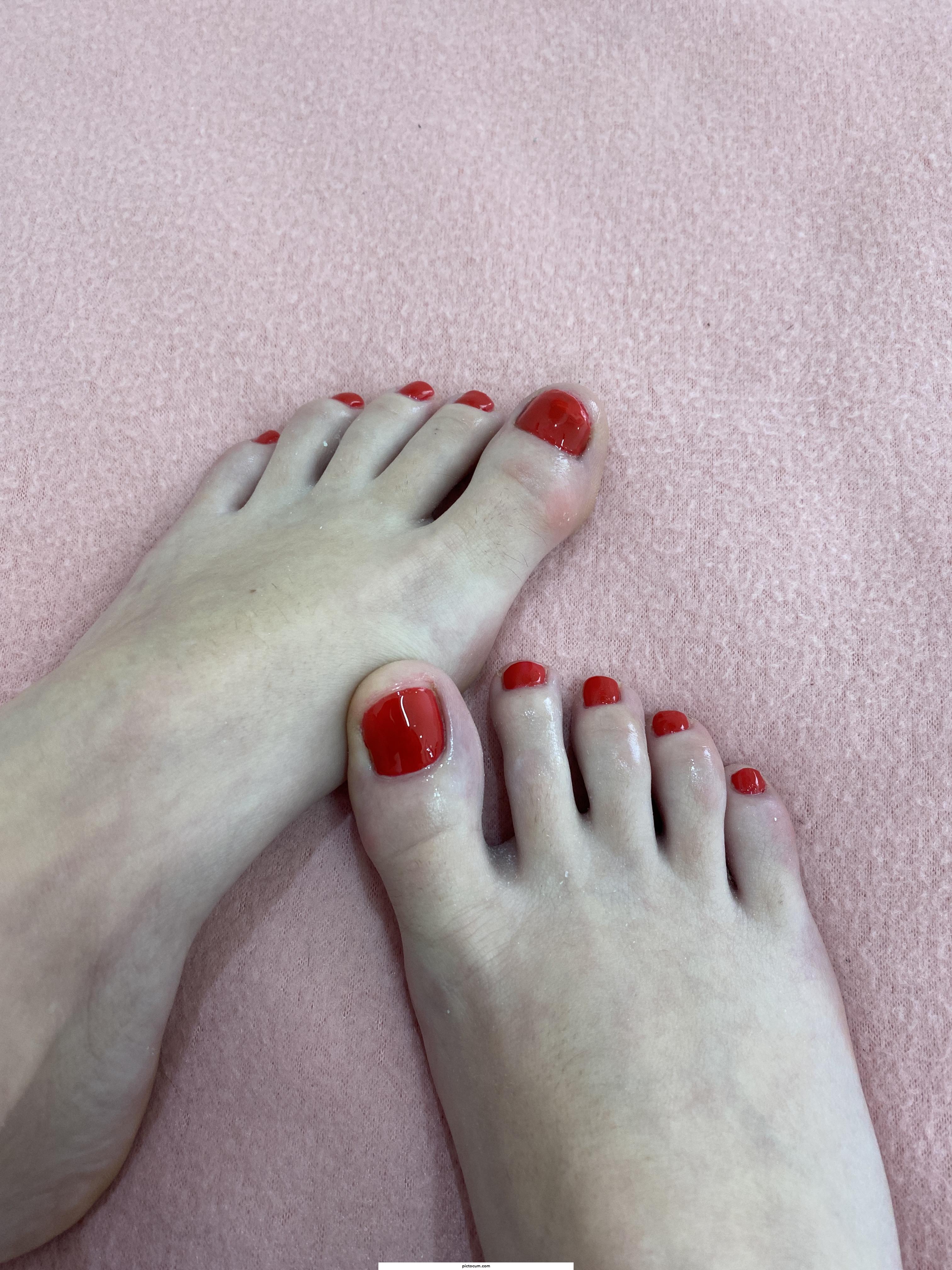 red pedicure looks very sexy and very erotic