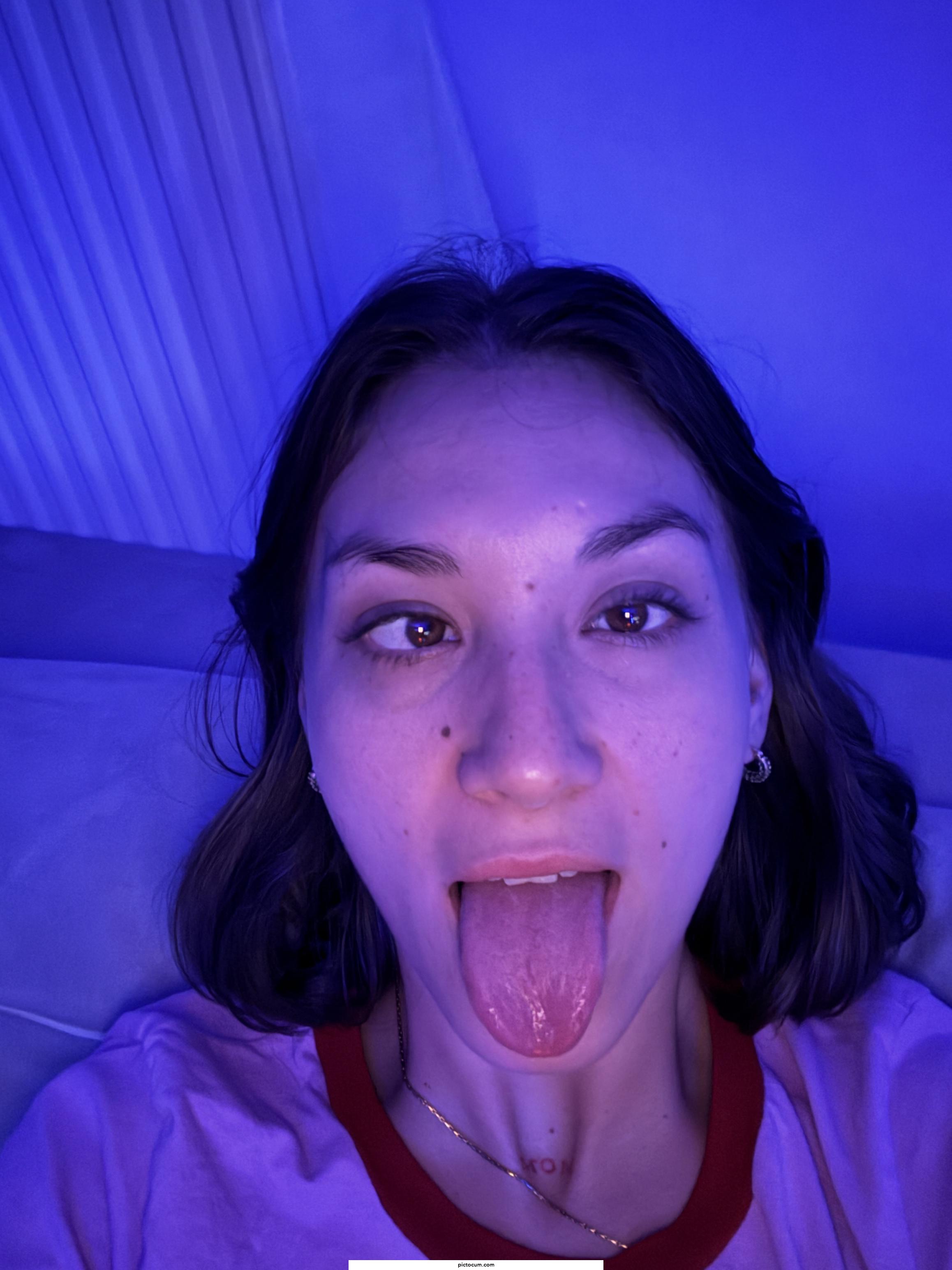 Ahegao ing in a blue background